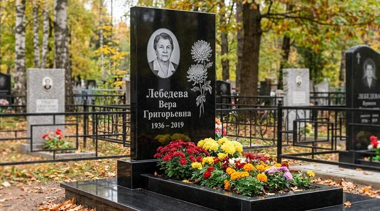 Памятник с гравировкой хризантем — выполненная работа «Лебедева» в Волгограде