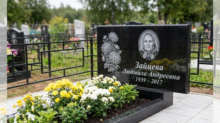 Памятник с гравировкой хризантем — выполненная работа «Зайцева» в Волгограде