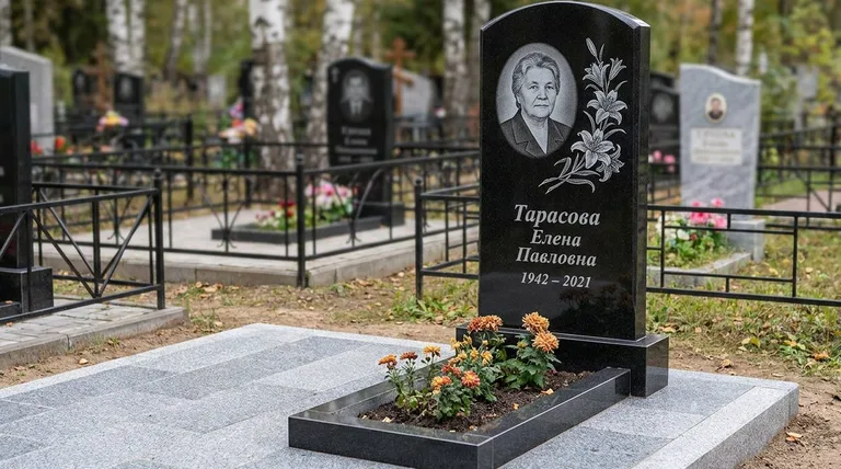 Памятник с гравировкой лилий — выполненная работа «Тарасова» в Волгограде