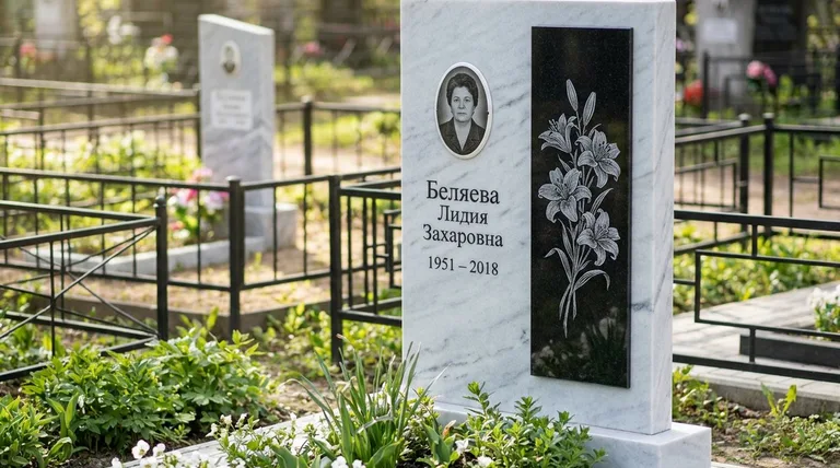 Памятник с гравировкой лилий — выполненная работа «Беляева» в Волгограде