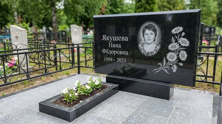 Памятник с гравировкой ромашек — выполненная работа «Якушева» в Волгограде