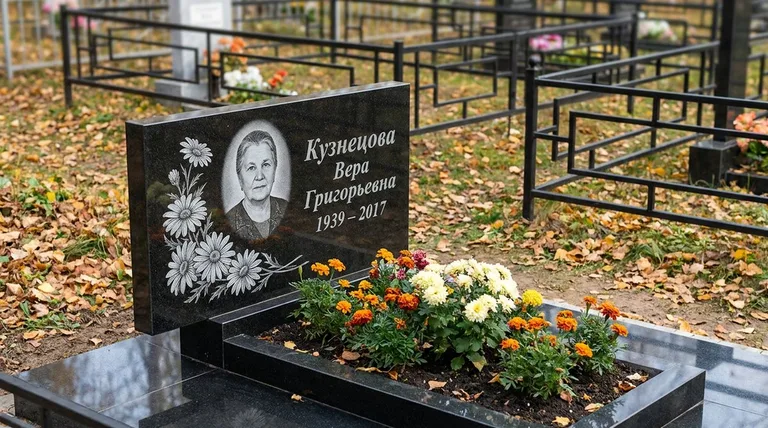 Памятник с гравировкой ромашек — выполненная работа «Кузнецова» в Волгограде