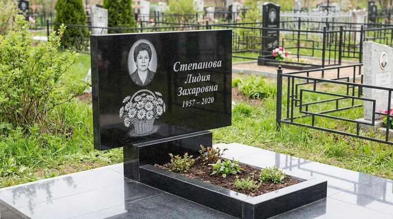 Памятник с гравировкой ромашек — выполненная работа «Степанова» в Волгограде