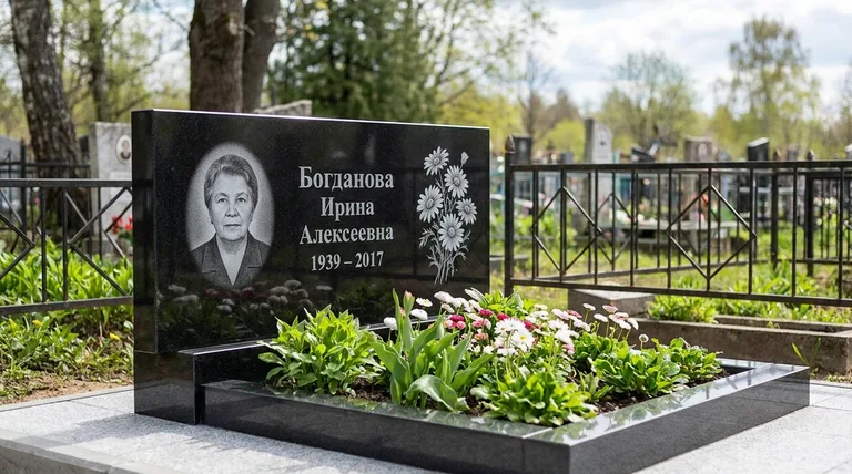 Памятник с гравировкой ромашек — выполненная работа «Богданова» в Волгограде