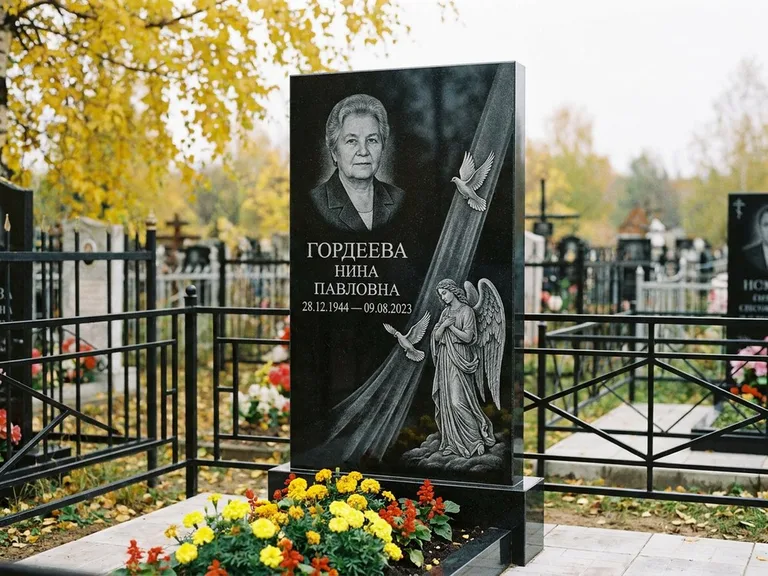 Памятник с гравировкой ангела — гравировка ангела с голубем по диагонали стелы, работа «Гордеева» в Волгограде