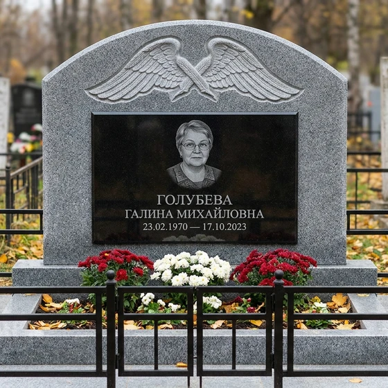 Памятник с парящими крыльями ангела из мансуровского гранита
